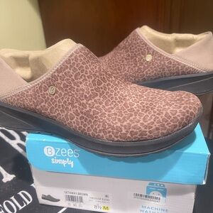 Bzees Brown Mules & Clogs with Textured Upper and Slip-On Design